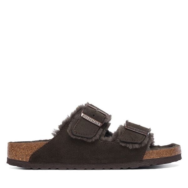 Klapki Birkenstock. Brązowe klapki Birkenstock, bez wzorów, bez obcasa, bez zapięcia. Za 749.99 zł.