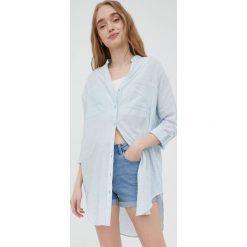 Vero Moda koszula bawełniana damska relaxed. Niebieskie koszule Vero Moda, s, bez wzorów, z bawełny, bez kołnierzyka, bez ramiączek. W wyprzedaży za 97.99 zł.