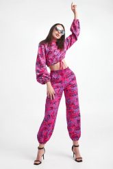 Spodnie dresowe damskie VERSACE JEANS COUTURE. Spodnie dresowe Versace Jeans Couture, bez wzorów, z dresówki. W wyprzedaży za 863.37 zł.