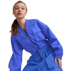 Kurtka Puma Dare To Woven, Kobiety. Niebieskie kurtki do biegania Puma, bez wzorów, z nylonu, bez kaptura, do biegania. Za 390.00 zł.