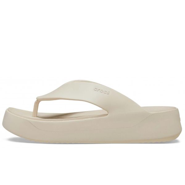 Klapki Crocs Getaway Platform Flip W Damskie. Białe klapki Crocs, bez wzorów, z materiału, bez obcasa, na koturnie, bez zapięcia. Za 199.99 zł.