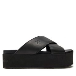 Klapki Calvin Klein Jeans. Czarne klapki Calvin Klein Jeans, bez wzorów, z jeansu, bez obcasa, bez zapięcia. Za 439.99 zł.