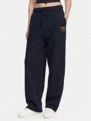 Tommy Hilfiger Spodnie dresowe Logo Exaggerated Seam WW0WW50783 Granatowy Relaxed Fit. Niebieskie spodnie dresowe Tommy Hilfiger, bez wzorów, z bawełny. Za 649.99 zł.