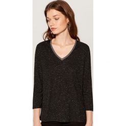 Bluzka z połyskującą lamówką - Czarny. Bluzki marki Mohito. Za 59.99 zł.