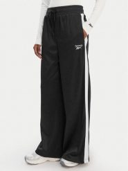 Reebok Spodnie dresowe Dianne RK25512CCW Czarny Relaxed Fit. Czarne spodnie dresowe Reebok, bez wzorów, z dresówki. Za 199.99 zł.