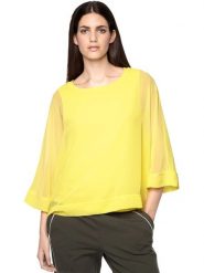 Heine Bluzka w kolorze żółtym rozmiar: 34. Żółte bluzki Heine, bez wzorów, bez kołnierzyka, bez ramiączek. Za 126.99 zł.