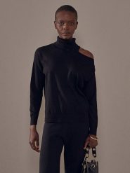 Rodier Golf w kolorze czarnym rozmiar: XL. Czarne swetry Rodier, xl, bez wzorów, ze splotem, klasyczne, bez ramiączek. Za 195.99 zł.