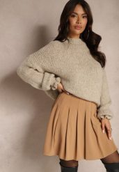 Beżowa Spódnica z Wiskozą o Rozkloszowanym Kroju z Plisami i Gumką w Pasie w Stylu Preppy Iliola. Brązowe spódnice Renee, na co dzień, l, bez wzorów, z wiskozy, eleganckie, mini, koszulowe. W wyprzedaży za 75.99 zł.