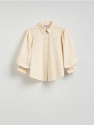 Koszula z bufiastymi rękawami - kremowy. Białe koszule Reserved, l, bez wzorów, z bawełny, bez kołnierzyka, bez ramiączek. Za 119.99 zł.