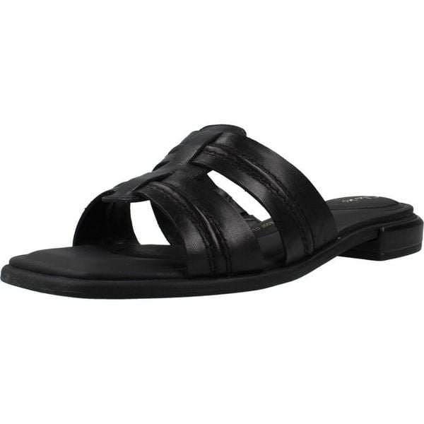 Sandały CLARKS ARIANY MULE Czarny. Czarne sandały Clarks, bez wzorów, ze skóry, bez obcasa, bez zapięcia. Za 215.99 zł.