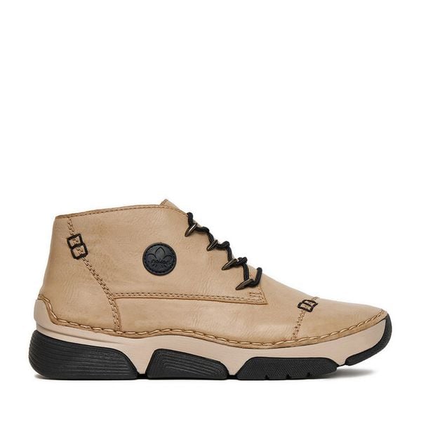 Trzewiki Rieker. Brązowe botki Rieker, bez wzorów, bez obcasa, na płaskiej podeszwie, bez zapięcia. Za 259.99 zł.