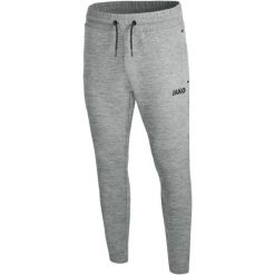 Damskie spodnie dresowe Jako jogging Premium Basics. Szare spodnie sportowe JAKO, bez wzorów, z dresówki, do biegania. Za 365.00 zł.