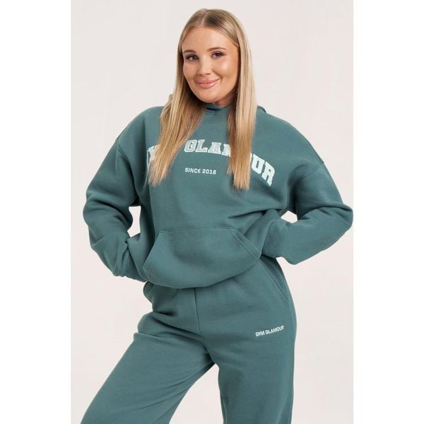 Bluza fitness damska Gym Glamour college. Niebieskie bluzy GYM GLAMOUR, xl, bez wzorów, glamour, bez ramiączek, bez kaptura. Za 199.99 zł.