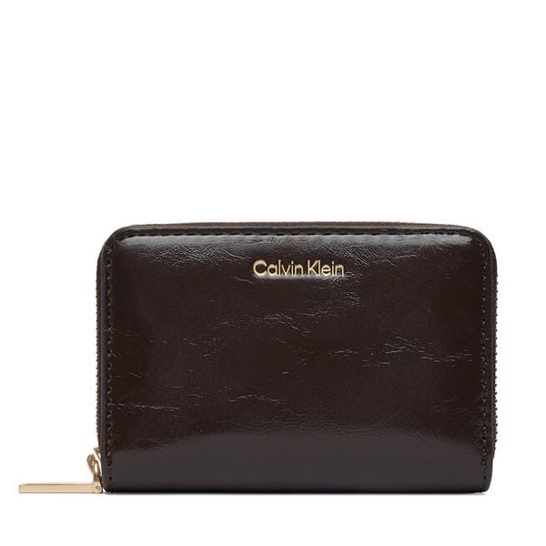 Portfel Calvin Klein. Brązowe portfele Calvin Klein, bez wzorów. Za 249.99 zł.