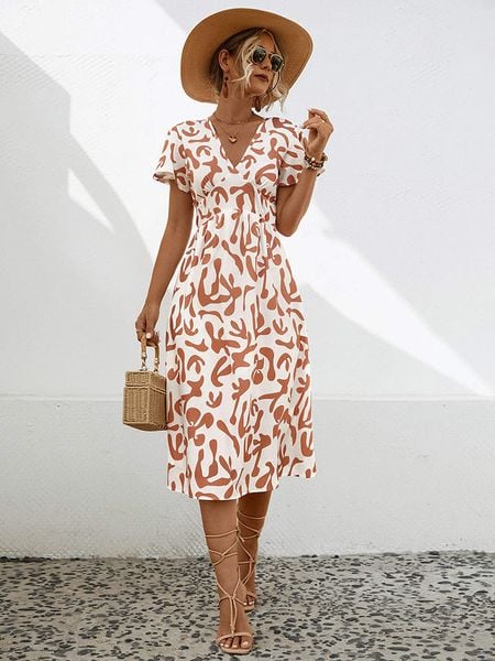 Ariel Tesoro Sukienka w kolorze biało-karmelowym rozmiar: 38. Białe sukienki Ariel Tesoro, bez wzorów, bez kołnierzyka, bez ramiączek, midi. Za 170.87 zł.