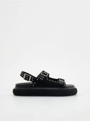 Skórzane sandały - czarny. Czarne sandały Reserved, bez wzorów, ze skóry, bez obcasa, bez zapięcia. Za 169.99 zł.