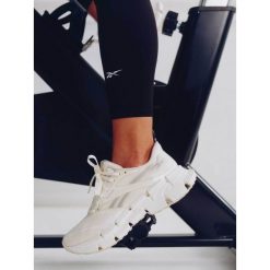Buty do biegania Reebok. Białe buty do biegania Reebok, bez wzorów, bez zapięcia, do biegania. Za 489.99 zł.