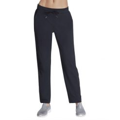 Spodnie sportowe damskie Slip-Ins: GO Walk Uptown Pant. Niebieskie spodnie dresowe Skechers, bez wzorów, z nylonu. Za 229.99 zł.
