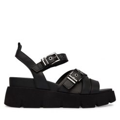 Sandały Tamaris. Czarne sandały Tamaris, bez wzorów, bez obcasa, na koturnie, bez zapięcia. Za 299.99 zł.