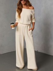 Milan Kiss 2-częściowy zestaw w kolorze beżowym rozmiar: XL. Brązowe spodnie dresowe Milan Kiss, bez wzorów, z dresówki. Za 200.60 zł.