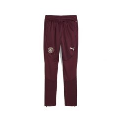 Młodzieżowe spodnie treningowe Manchester City PUMA Dark Jasper Red. Czerwona spodnie dresowe Puma, bez wzorów, z dresówki. W wyprzedaży za 189.00 zł.