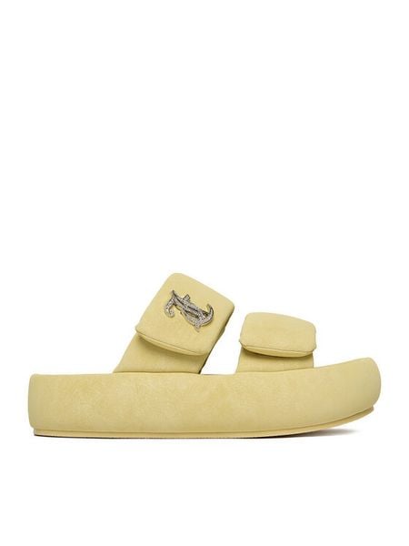 Juicy Couture Klapki CEO-WSS21515-06 Żółty. Żółte klapki Juicy Couture, bez wzorów, ze skóry, bez obcasa, bez zapięcia. Za 149.99 zł.
