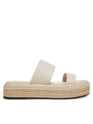 Calvin Klein Klapki Flatform Wedge Slide - He HW0HW02374 Kremowy. Białe klapki Calvin Klein, bez wzorów, ze skóry, bez obcasa, bez zapięcia. Za 299.99 zł.