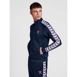 Bluza dresowa zapinana na zamek błyskawiczny Hummel IC Lerby Poly. Niebieskie bluzy z kapturem Hummel, xs, bez wzorów, z dresówki, bez kaptura. Za 336.00 zł.