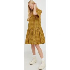 Levi's sukienka kolor żółty mini rozkloszowana. Żółte sukienki Levi's, l, bez wzorów, bez kołnierzyka, bez ramiączek, mini, rozkloszowane. Za 359.99 zł.