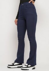 Niebieskie Spodnie Dzwony z Dodatkiem Bawełny Ozdobione Guzikiem Miavonnae. Niebieskie jeansy Born2be, m, bez wzorów, z bawełny, eleganckie. Za 79.99 zł.