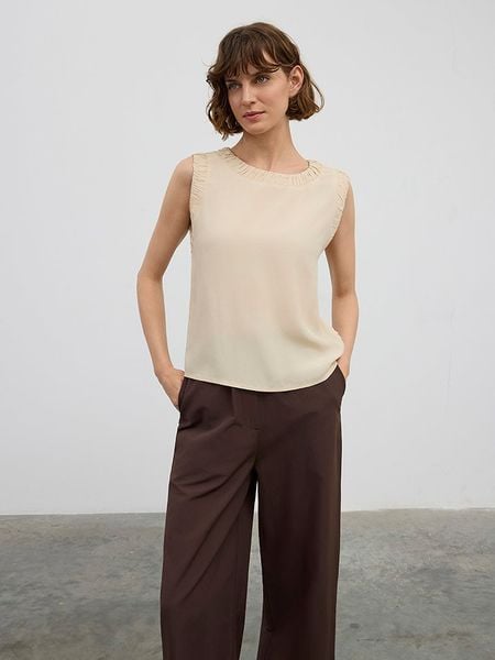 BGN Bluzka w kolorze beżowym rozmiar: 38. Brązowe bluzki BGN, bez wzorów, z wiskozy, bez kołnierzyka, bez ramiączek. Za 87.61 zł.