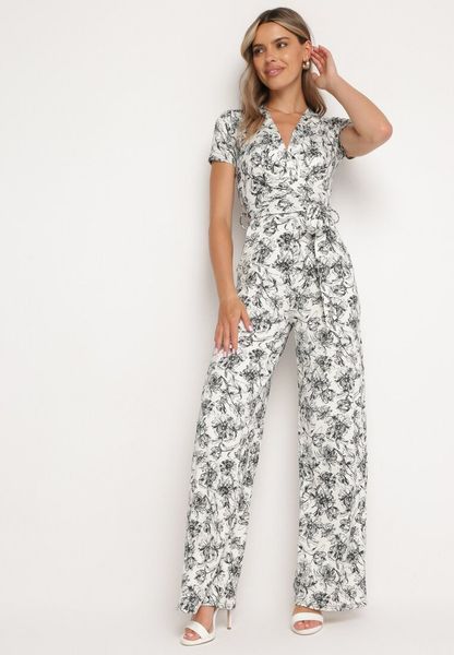 Biało-Czarny Kombinezon w Kwiaty z Krótkim Rękawem i Dekoltem w Serek z Długimi Nogawkami Nestaanne. Białe kombinezony Born2be, na co dzień, l, bez wzorów, z jeansu, eleganckie, bez kołnierzyka, bez ramiączek, mini. Za 139.99 zł.