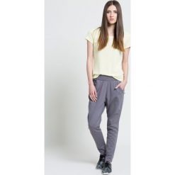 Adidas Performance - Spodnie Tapp. Szare spodnie sportowe marki adidas Performance, z dzianiny. W wyprzedaży za 199.90 zł.