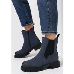 Niebieskie Botki Sztyblety Assamk. Niebieskie botki Born2be, bez wzorów, z materiału, klasyczne, z okrągłym noskiem, bez obcasa, na płaskiej podeszwie, bez zapięcia. W wyprzedaży za 149.99 zł.