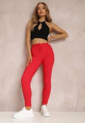 Czerwone Spodnie Actessa. Czerwone jeansy Renee, bez wzorów, z jeansu. W wyprzedaży za 35.99 zł.