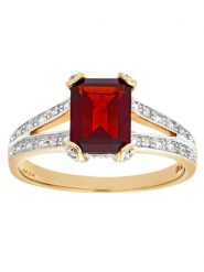 Revoni Złoty pierścionek z diamentami i granatem rozmiar: 63. Żółte pierścionki Revoni, z diamentem, złote. Za 2,601.99 zł.