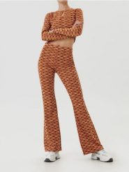 Legginsy flare ze wzorem geometrycznym - wielobarwny. Legginsy Sinsay, bez wzorów. Za 59.99 zł.