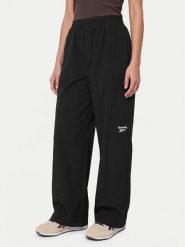 Reebok Spodnie dresowe Zofia RK25679CCW Czarny Relaxed Fit. Czarne spodnie dresowe Reebok, bez wzorów, z dresówki. Za 329.99 zł.