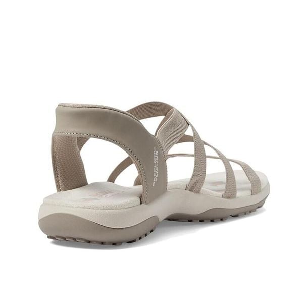 Sandały SKECHERS REGGAE SLIM Brązowy. Brązowe sandały Skechers, bez wzorów, z tkaniny, bez obcasa, bez zapięcia. Za 259.99 zł.