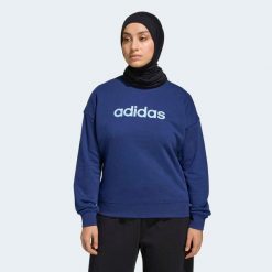 Bluza fitness damska ADIDAS. Niebieskie bluzy adidas, m, bez wzorów, z materiału, eleganckie, bez ramiączek, bez kaptura. Za 179.99 zł.