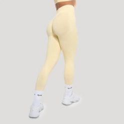 Legginsy damskie fitness bezszwowe Luma. Żółte legginsy GYMBEAM, bez wzorów, z elastanu. Za 110.90 zł.