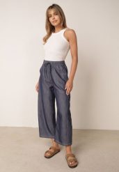 Niebieskie Spodnie Casual o Kroju Barrel z Wysokim Stanem i Ściągaczem w Talii Kosma. Niebieskie jeansy Born2be, bez wzorów, z jeansu, casualowe, z podwyższonym stanem. Za 79.99 zł.