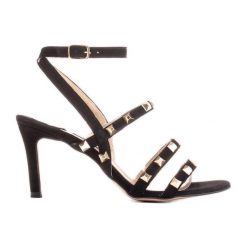 Marco Shoes Czarne sandały zamszowe z ćwiekami ozdobnymi. Czarne sandały bez wzorów, z zamszu, bez obcasa, bez zapięcia. Za 429.00 zł.
