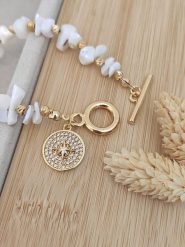 Nakkash Pozłacana bransoletka z kamieniami szlachetnymi rozmiar: onesize. Białe bransoletki Nakkash, z cyrkonią, pozłacane. Za 43.99 zł.