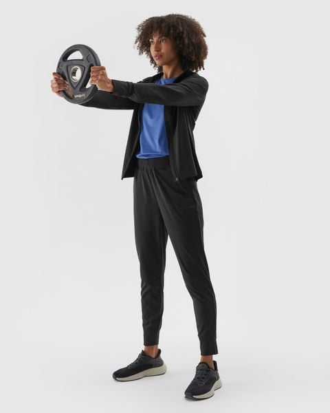 4F Spodnie treningowe szybkoschnące damskie - czarne XL. Czarne spodnie dresowe 4f, bez wzorów, z dzianiny, na fitness i siłownię. Za 179.99 zł.