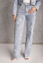 Niebieskie Szerokie Jeansy z Bawełną w Kwiaty Zinnetta. Niebieskie jeansy Renee, bez wzorów, z bawełny, z podwyższonym stanem. Za 119.99 zł.