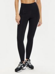Girlfriend Collective Legginsy Compressive 4007 Czarny Slim Fit. Czarne legginsy GIRLFRIEND COLLECTIVE, bez wzorów, z syntetyku, sportowe. Za 229.99 zł.
