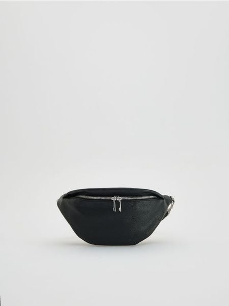 Saszetka crossbody - czarny. Czarne nerki i saszetki Reserved, bez wzorów, ze skóry, bez dodatków. Za 99.99 zł.