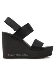 Calvin Klein Jeans Sandały Wedge Sandal Webbing In Mtl YW0YW01479 Czarny. Czarne sandały Calvin Klein Jeans, bez wzorów, z jeansu, bez obcasa, na koturnie, bez zapięcia. Za 319.99 zł.