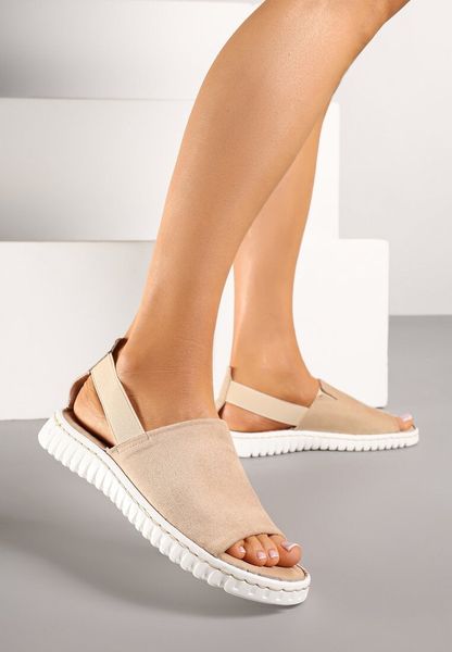 Beżowe Sandały Vices z Imitacji Zamszu z Elastycznym Paskiem Folalise. Brązowe sandały Born2be, bez wzorów, klasyczne, bez obcasa, na płaskiej podeszwie, bez zapięcia. Za 79.99 zł.